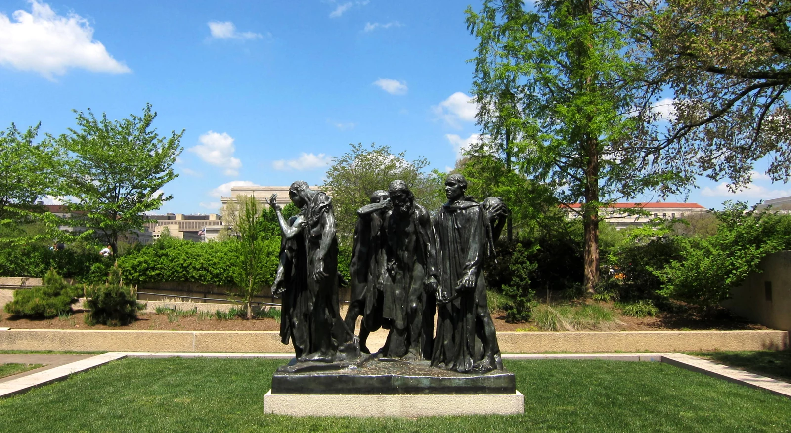 A group of bronze figures in The Burghers of Calais outside the Hirshhorn Museum.