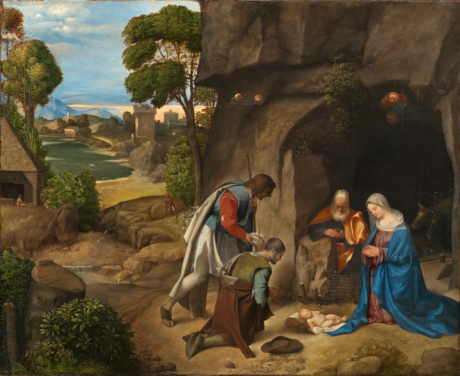 Giorgione's Adoration of the Shepherds places a luminous landscape beside the figures gathered at a dark grotto.